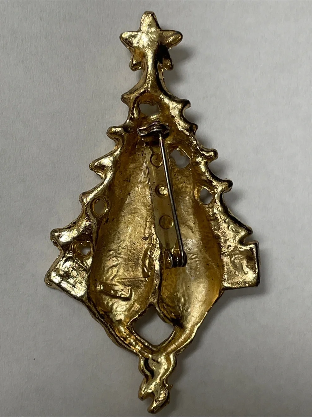 unmarked gold tone